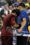 Janko Tipsarevic (L) of Serbia hugs Andy Roddick of the United States after defeating him in his second round men's singles match on day three of the 2010 U.S. Open at the USTA Billie Jean King National Tennis Center on September 1, 2010 in the Flushing neighborhood of the Queens borough of New York City . Getty Images/ Al Bello ..........