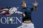 John Isner of the United States returns a shot against Mikhail Youzhny of Russia during the men's singles match on day seven of the 2010 U.S. Open at the USTA Billie Jean King National Tennis Center on September 5, 2010 in the Flushing neighborhood of the Queens borough of New York City. Nick Laham / Getty Images .....