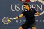 Roger Federer of Switzerland hits a return against Jurgen Melzer of Austria during day eight of the 2010 U.S. Open at the USTA Billie Jean King National Tennis Center on September 6, 2010 in the Flushing neighborhood of the Queens borough of New York City.